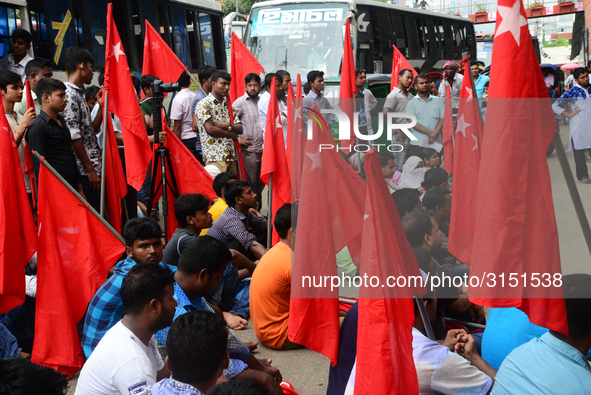 Activists from Bangladeshi garments organization stage demonstration in Dhaka rejecting the government’s decision to raise their minimum mon...