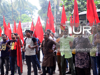 Activists from Bangladeshi garments organization stage demonstration in Dhaka rejecting the government’s decision to raise their minimum mon...