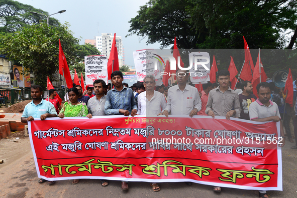 Activists from Bangladeshi garments organization stage demonstration in Dhaka rejecting the government’s decision to raise their minimum mon...