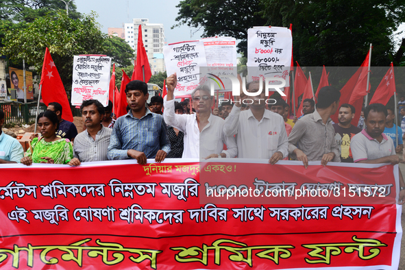 Activists from Bangladeshi garments organization stage demonstration in Dhaka rejecting the government’s decision to raise their minimum mon...