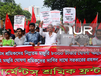 Activists from Bangladeshi garments organization stage demonstration in Dhaka rejecting the government’s decision to raise their minimum mon...