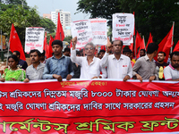 Activists from Bangladeshi garments organization stage demonstration in Dhaka rejecting the government’s decision to raise their minimum mon...