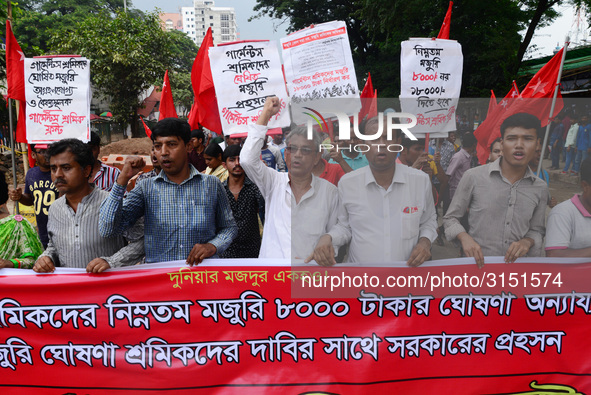 Activists from Bangladeshi garments organization stage demonstration in Dhaka rejecting the government’s decision to raise their minimum mon...