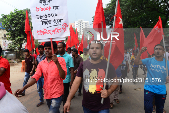 Activists from Bangladeshi garments organization stage demonstration in Dhaka rejecting the government’s decision to raise their minimum mon...