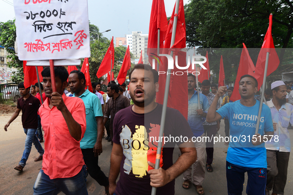 Activists from Bangladeshi garments organization stage demonstration in Dhaka rejecting the government’s decision to raise their minimum mon...