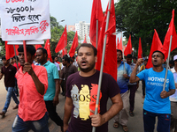 Activists from Bangladeshi garments organization stage demonstration in Dhaka rejecting the government’s decision to raise their minimum mon...