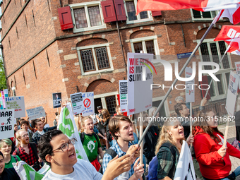 Hundreds of students gathered on 14 September 2018 at the Dam square in Amsterdam, Netherlands to protest against the increase of the intere...