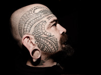 Portraits of tattooed people, in Milan, Italy. (