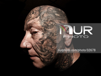 Portraits of tattooed people, in Milan, Italy. (