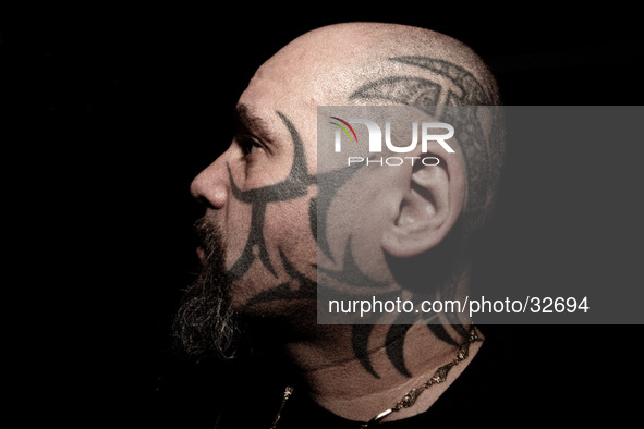 Portraits of tattooed people, in Milan, Italy. 