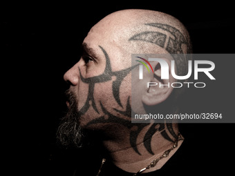 Portraits of tattooed people, in Milan, Italy. (