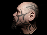 Portraits of tattooed people, in Milan, Italy. (