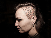 Portraits of tattooed people, in Milan, Italy. (