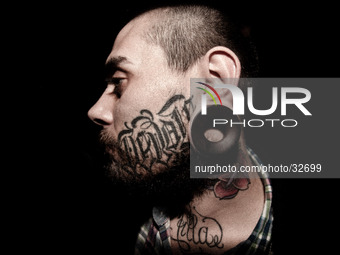 Portraits of tattooed people, in Milan, Italy. (