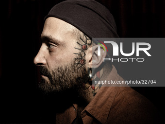 Portraits of tattooed people, in Milan, Italy. (