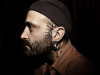 Portraits of tattooed people, in Milan, Italy. (