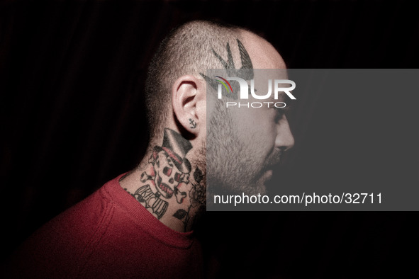 Portraits of tattooed people, in Milan, Italy. 