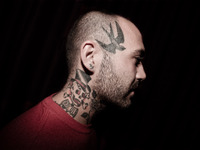 Portraits of tattooed people, in Milan, Italy. (