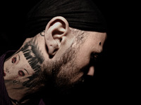 Portraits of tattooed people, in Milan, Italy. (