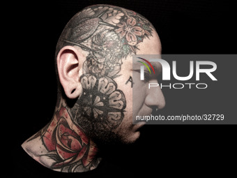 Portraits of tattooed people, in Milan, Italy. (