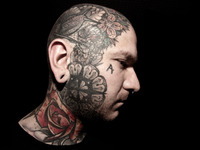 Portraits of tattooed people, in Milan, Italy. (