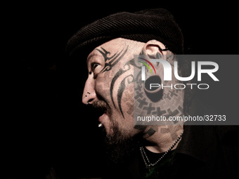 Portraits of tattooed people, in Milan, Italy. (