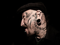 Portraits of tattooed people, in Milan, Italy. (