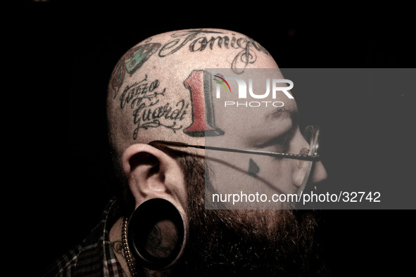 Portraits of tattooed people, in Milan, Italy. 