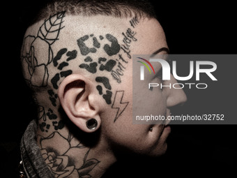 Portraits of tattooed people, in Milan, Italy. (