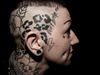 Portraits of tattooed people, in Milan, Italy. (