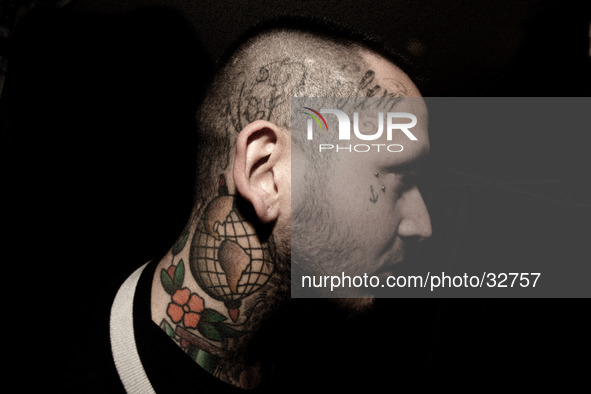 Portraits of tattooed people, in Milan, Italy. 