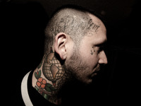 Portraits of tattooed people, in Milan, Italy. (