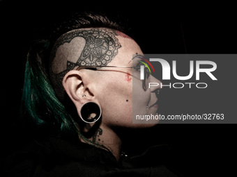 Portraits of tattooed people, in Milan, Italy. (