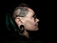 Portraits of tattooed people, in Milan, Italy. (