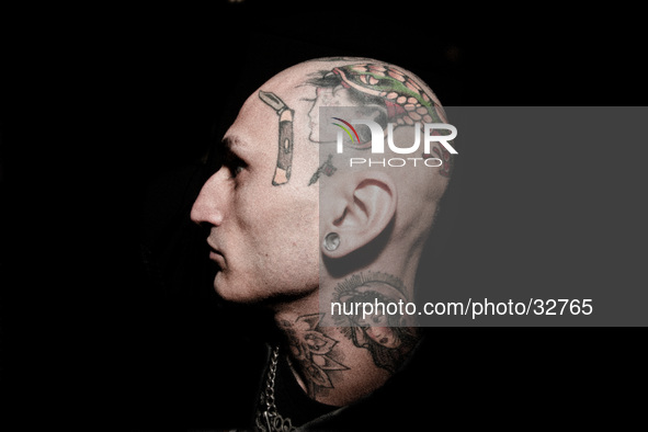 Portraits of tattooed people, in Milan, Italy. 