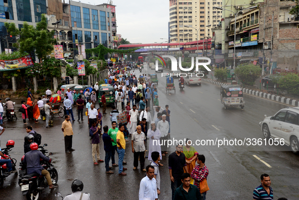 Bangladeshi Passengers waits for public buses near the roads on the first day of 48-hour countrywide transport strike in Dhaka, Bangladesh,...