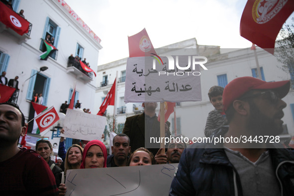 Unionists and workers rallied outside the headquarter of the Tunisian General Labour Union (UGTT), on November 17, 2018 in Tunis, where the...