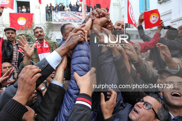 Unionists and workers rallied outside the headquarter of the Tunisian General Labour Union (UGTT), on November 17, 2018 in Tunis, where the...