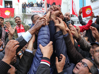 Unionists and workers rallied outside the headquarter of the Tunisian General Labour Union (UGTT), on November 17, 2018 in Tunis, where the...