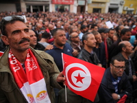 Unionists and workers rallied outside the headquarter of the Tunisian General Labour Union (UGTT), on November 17, 2018 in Tunis, where the...