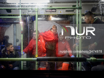a migrant being helped by the red cross staffs to get inside of the bus to be transferred to a center. 22-11-2018, Malaga. The Spaniard Mari...