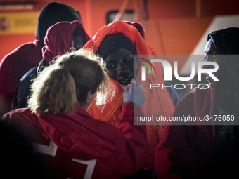 A migrant being attended by a staff of the red cross team. 22-11-2018, Malaga. The Spaniard Maritime vessel rescued in the Mediterranean sea...