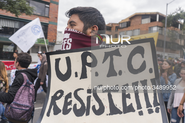 A student of the National Pedagogical University participates in the March of students for public education in Bogota, Colombia, on 28 Novem...