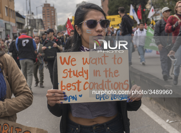 A student of the National Pedagogical University participates in the March of students for public education in Bogota, Colombia, on 28 Novem...