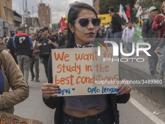 A student of the National Pedagogical University participates in the March of students for public education in Bogota, Colombia, on 28 Novem...