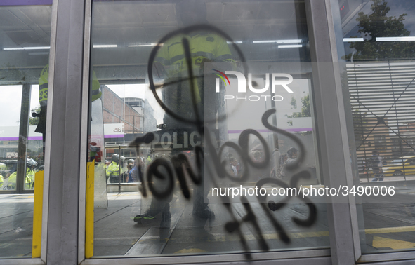 Graffiti at the doors of public transportation in the march of students for public education in Bogota, Colombia, on 28 November 2018. 