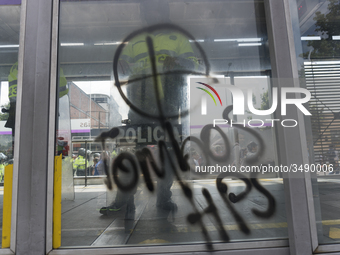 Graffiti at the doors of public transportation in the march of students for public education in Bogota, Colombia, on 28 November 2018. (