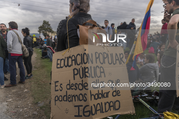 A student of the National Pedagogical University participates in the March of students for public education in Bogota, Colombia, on 28 Novem...