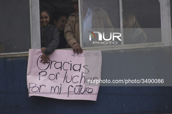 People hold a poster on the march of students for public education in Bogota, Colombia, on 28 November 2018.

 