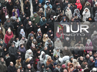 KIEV, UKRAINE - NOVEMBER 30: People make the sign of the Cross during the prayer for peace headed by The head of the Ukrainian Orthodox Chur...